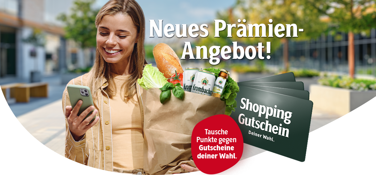 Frau hält Smartphone und Einkaufstüte mit Brot, Gemüse sowie Krombacher Dosen und Flaschen. Daneben sind Shopping Gutscheine deiner Wahl abgebildet. Text: 'Neues Prämien-Angebot! Tausche Punkte gegen Gutscheine deiner Wahl.