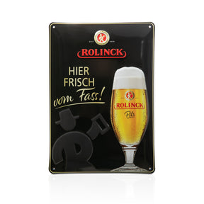Schwarzes Blechschild mit einem Glas Bier, Schriftzug 'ROLINCK', 'HIER FRISCH vom Fass!' und einem roten Logo mit Brauereisymbol.