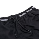 Schwarze Badehose mit elastischem Bund und weißem Schriftzug 'Krombacher' am Bund, mit schwarzem Kordelzug.