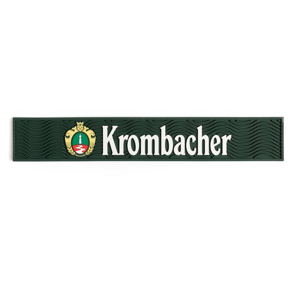 Dunkelgrüne Barmatte aus Gummi mit wellenförmiger Oberfläche und Krombacher Logo.