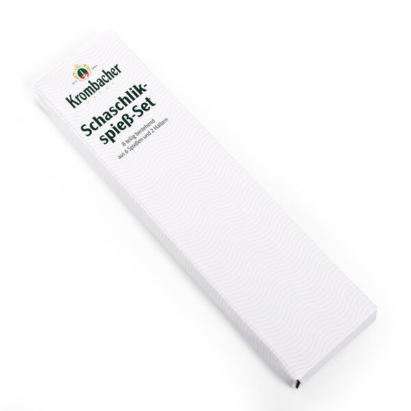 7419_krombachershop_Schaschlikspiess_Set_Produkt_003 Verpackung des Krombacher Schaschlikspieß-Sets mit Aufschrift und Logo, länglich und weiß mit feinem Wellenmuster.