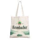 Beiger Jutebeutel mit grünem Krombacher-Logo, Text 'Krombacher' und Landschaftsmotiv in Grüntönen.