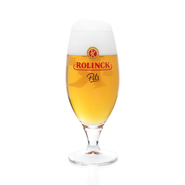 Glas mit goldgelbem Rolnick Pils Bier und weißer Schaumkrone in 0,25 L Pokalglas.