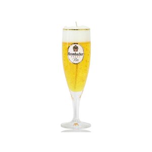 Kerze in Form eines Krombacher Pils Bierglases mit Schaumkrone und Logo auf dem Glas.